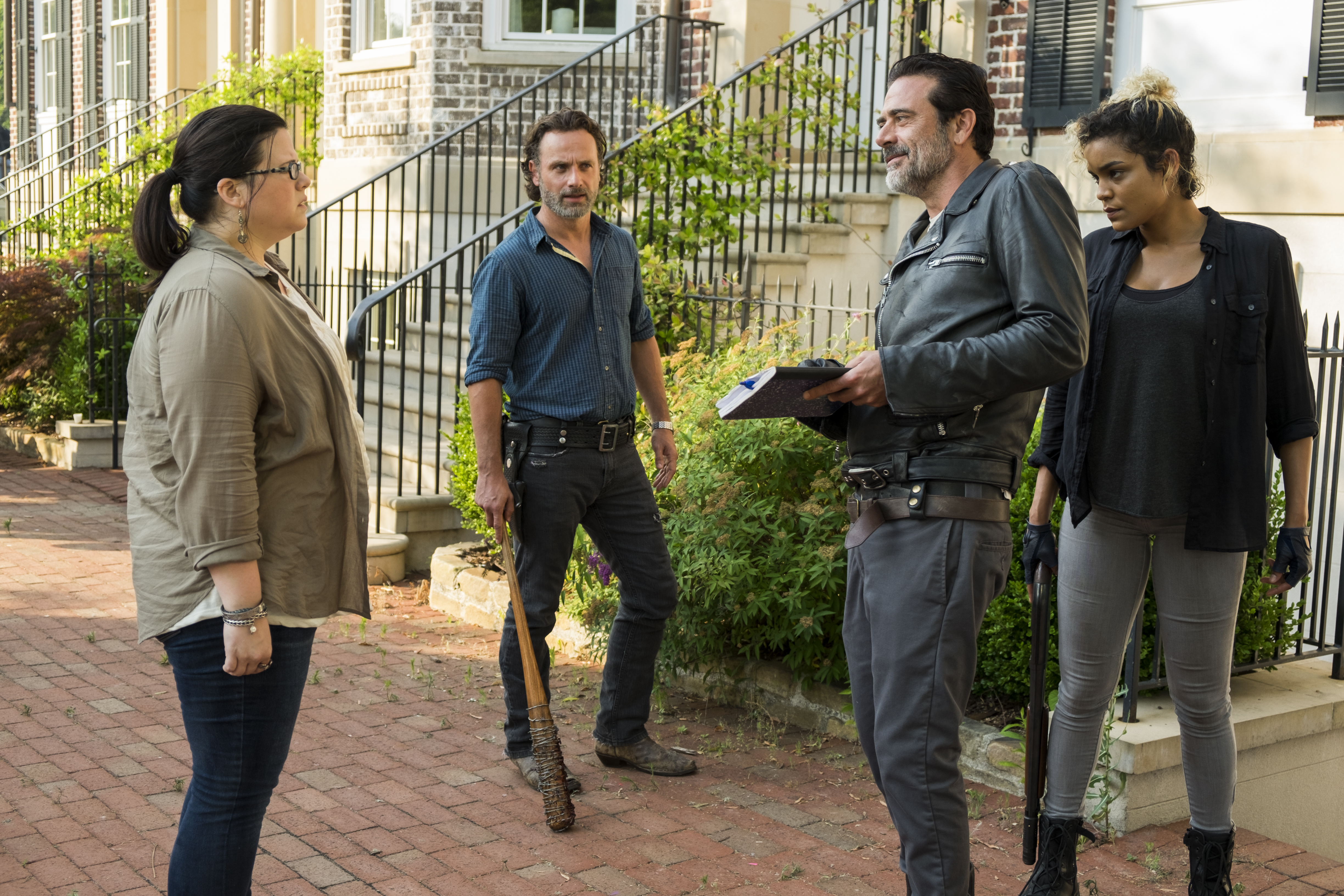 Which two guns were missing when Negan arrived?