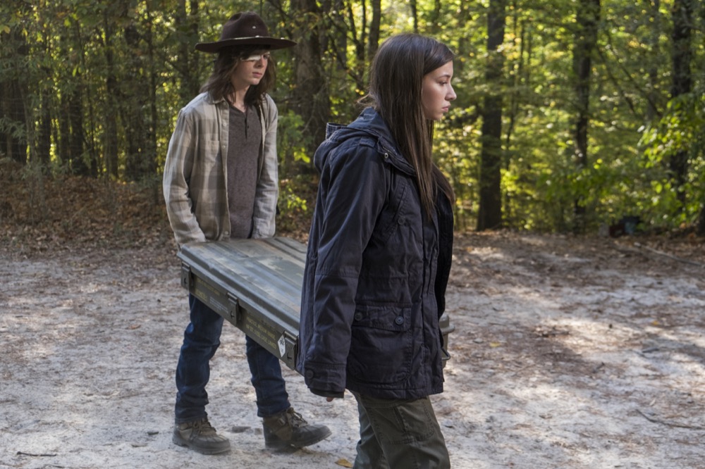 Chandler Riggs as Carl Grimes, Katelyn Nacon as Enid - The Walking Dead _ Season 7, Episode 15 - Photo Credit: Gene Page/AMC