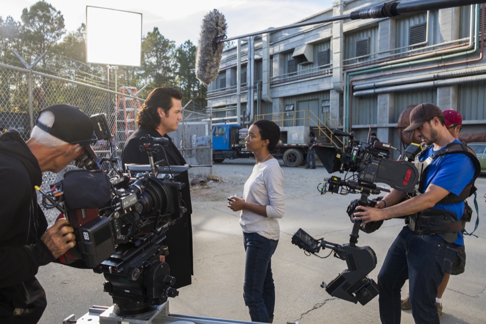 BTS, Josh McDermitt as Dr. Eugene Porter, Sonequa Martin-Green as Sasha Williams, A Camera Operator Stepehn Campbell - The Walking Dead _ Season 7, Episode 16 - Photo Credit: Gene Page/AMC