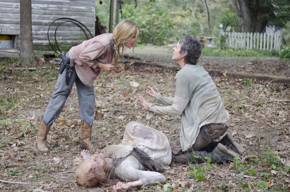 Lizzie (Brighton Sharbino), Carol (Melissa Suzanne McBride) and Walker - The Walking Dead _ Season 4, Episode 14 - Photo Credit: Gene Page/AMC