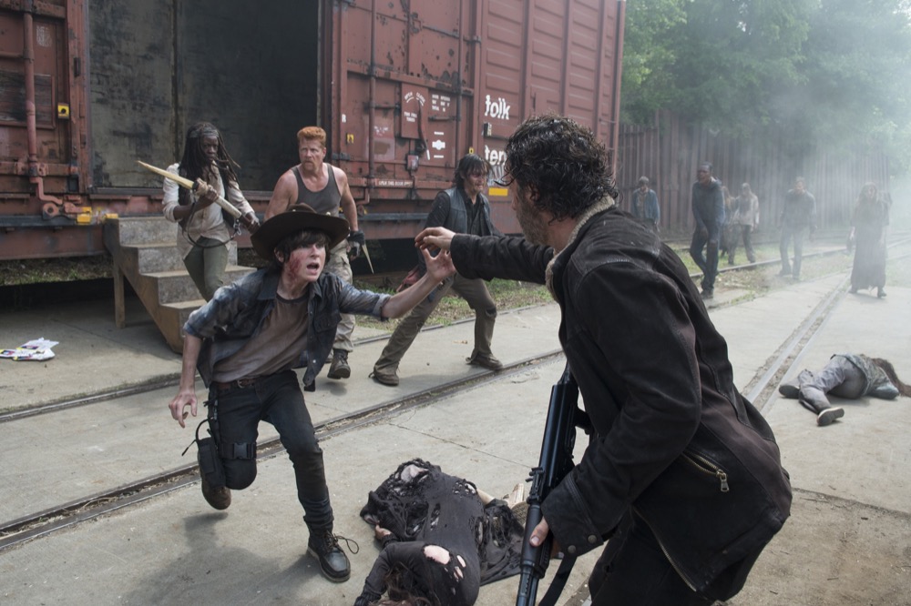 Danai Gurira as Michonne,  Michael Cudlitz as Abraham, Norman Reedus as Daryl Dixon, Chandler Riggs as Carl Grimes and Andrew Lincoln as Rick Grimes - The Walking Dead _ Season 5, Episode 1 - Photo Credit: Gene Page/AMC