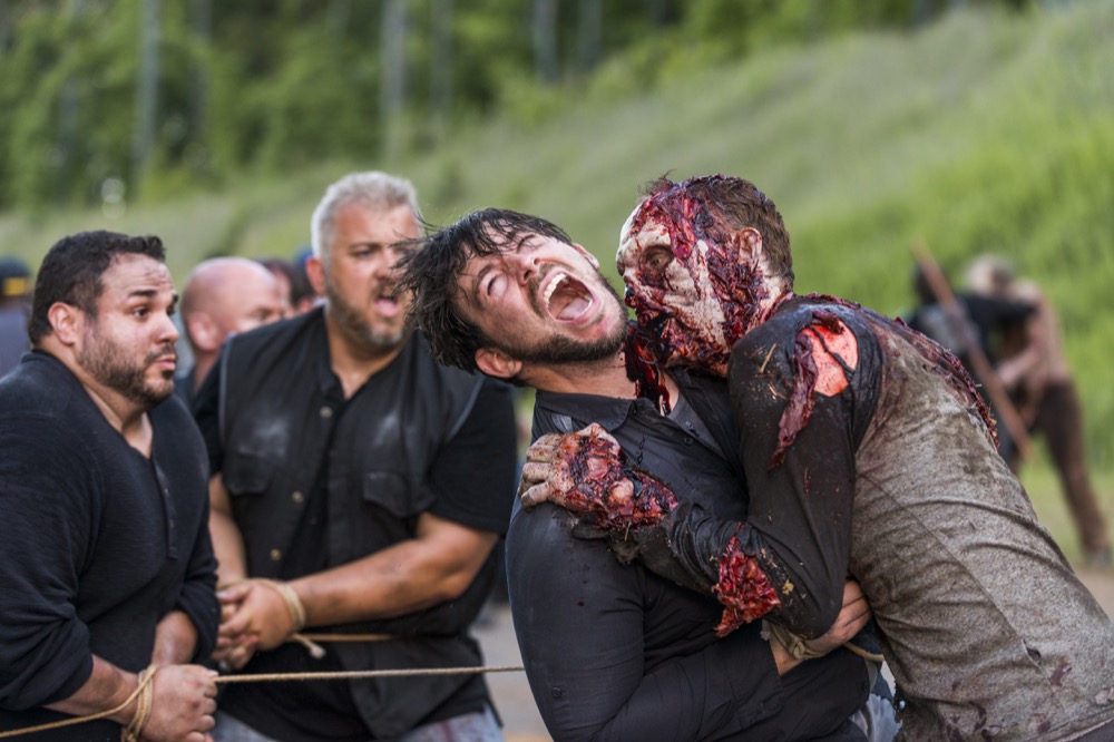 A walker attacks- The Walking Dead _ Season 8, Episode 3 - Photo Credit: Gene Page/AMC