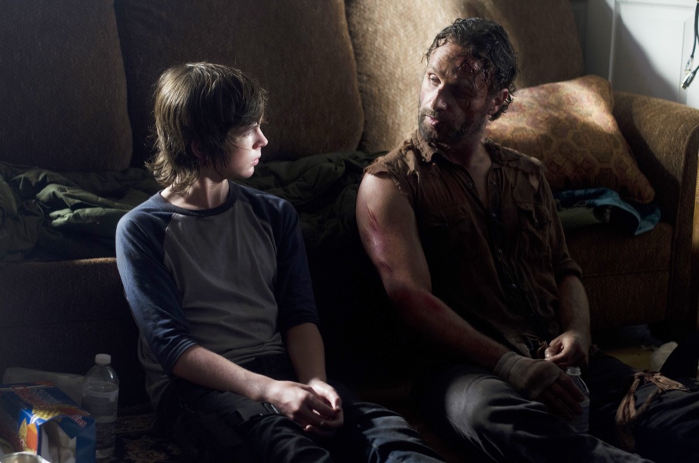 Carl Grimes (Chandler Riggs) and Rick Grimes (Andrew Lincoln) - The Walking Dead _ Season 4, Episode 9 - Photo Credit: Gene Page/AMC