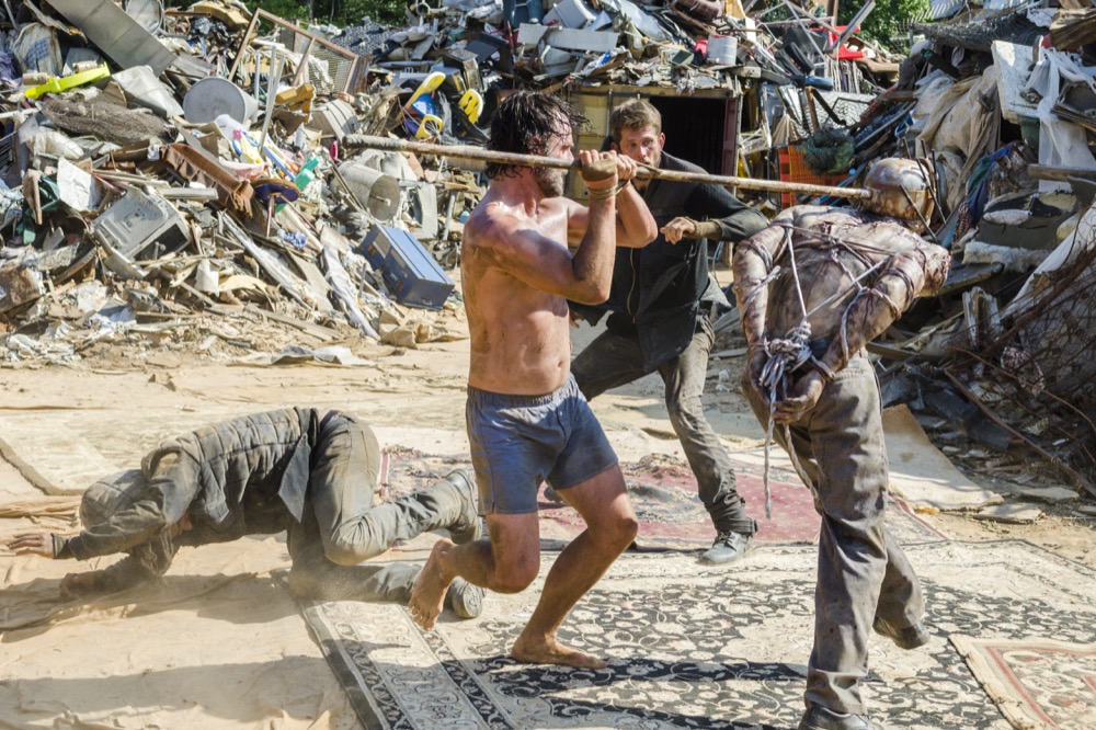 George Quinones as Pole Scavenger, Liam Day as Scavenger Guard, Lance Herota as Pole Walker, Andrew Lincoln as Rick Grimes - The Walking Dead _ Season 8, Episode 7 - Photo Credit: Gene Page/AMC